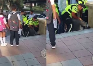 Polis əməkdaşlarının sürücünü məktəbli övladlarının gözü qarşısında döydüyü iddia olunurdu
