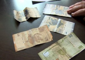 Cırılmış, ləkələnmiş, rəngi solmuş pulları nə etməli? - Mərkəzi Bank açıqladı