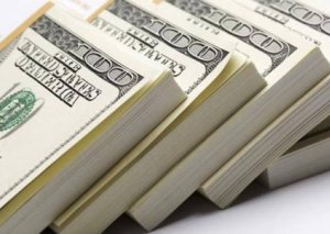 Dollar fond bazarında çaxnaşma fonunda bahalaşır